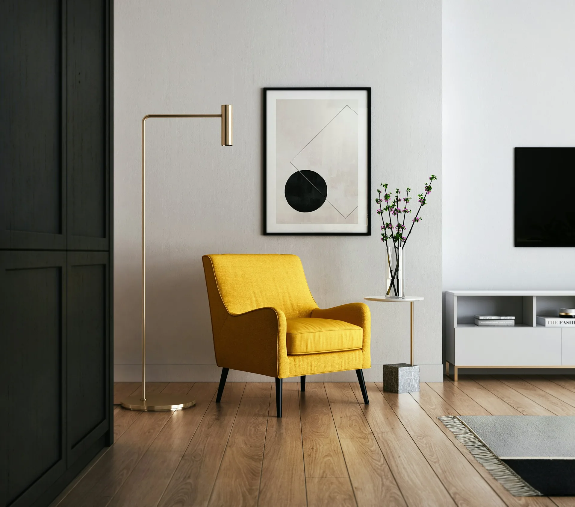 Calm, light interior with a yellow armchair and oak floors